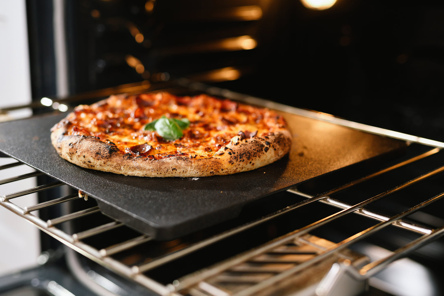 https://pizzori.com/cdn/shop/articles/How_to_use_your_pizzori_steel_in_the_oven.jpg?v=1682717101&width=1500